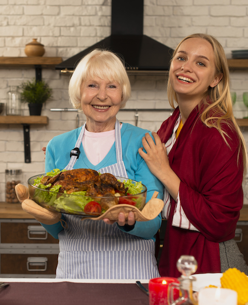 caregiver preparing healthy meals for senior at home in Toronto