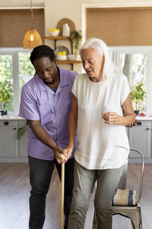caregiver assisting senior with mobility and escort services in Toronto