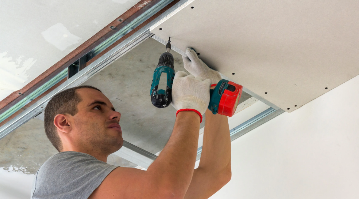 handyman repairing drywall cracks in Toronto home