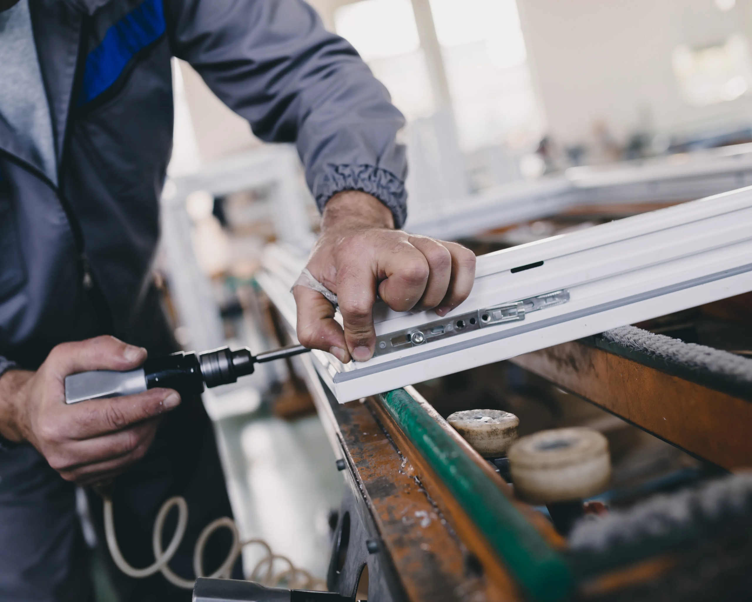 handyman fixing door hinge and window lock in Toronto