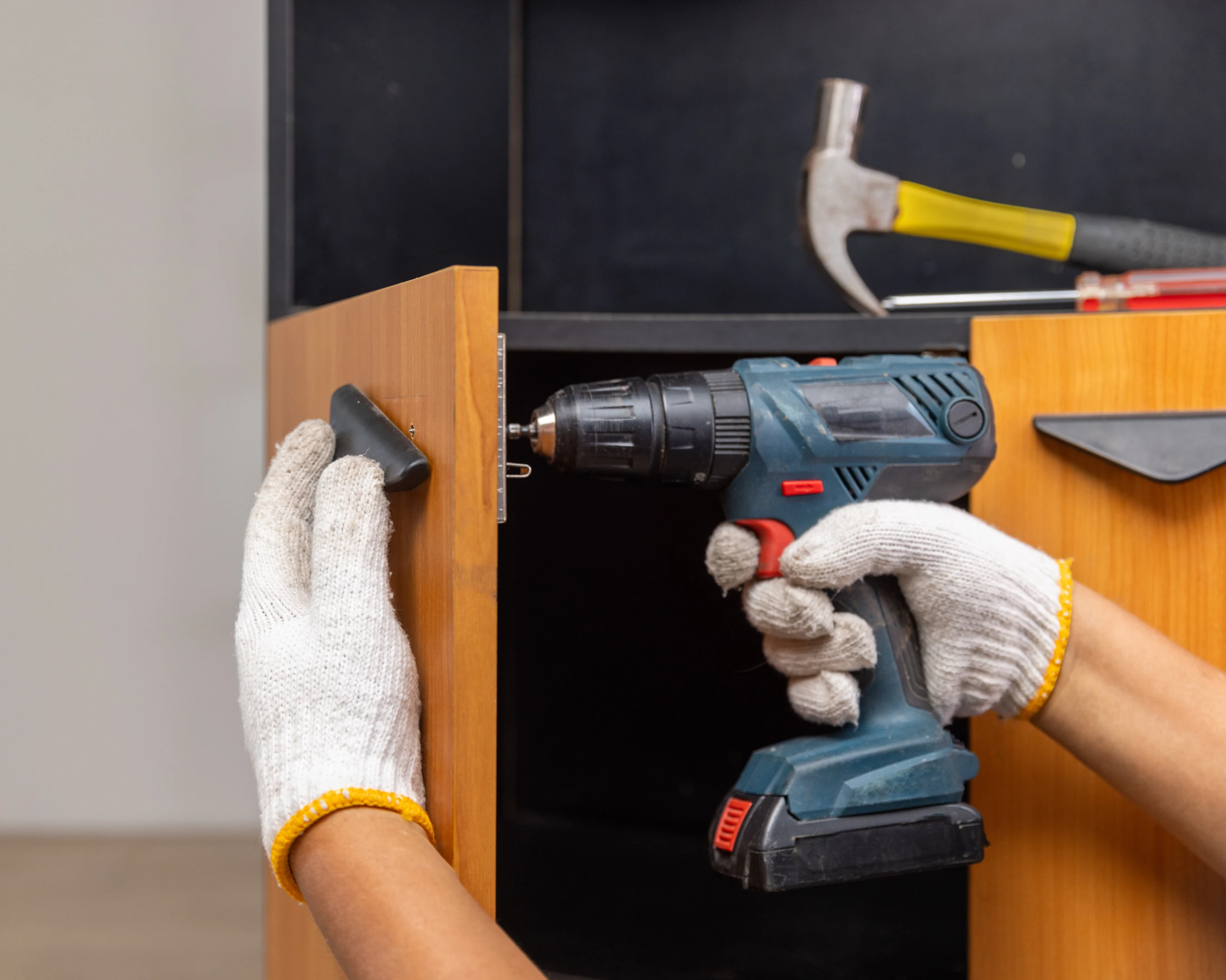 Before-and-after photo of kitchen cabinet refacing with new doors